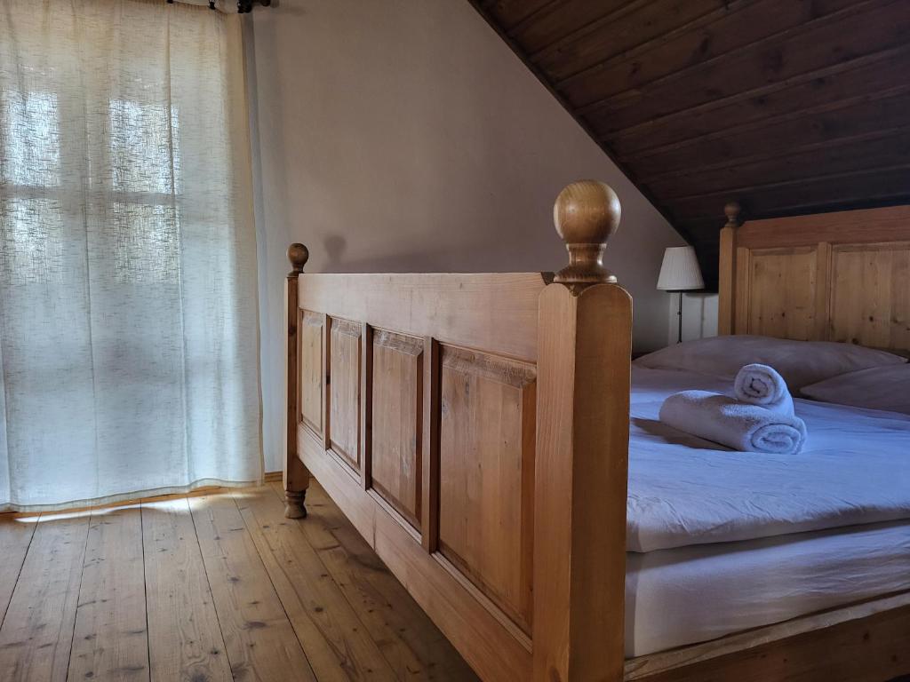 Postel nebo postele na pokoji v ubytování Apartmány Červený Dvůr