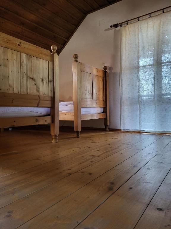 Postel nebo postele na pokoji v ubytování Apartmány Červený Dvůr