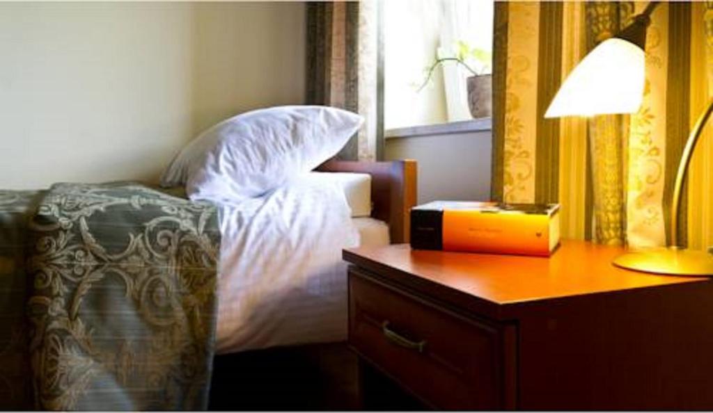Postel nebo postele na pokoji v ubytování HOTEL I RESTAURACJA BROCHÓW