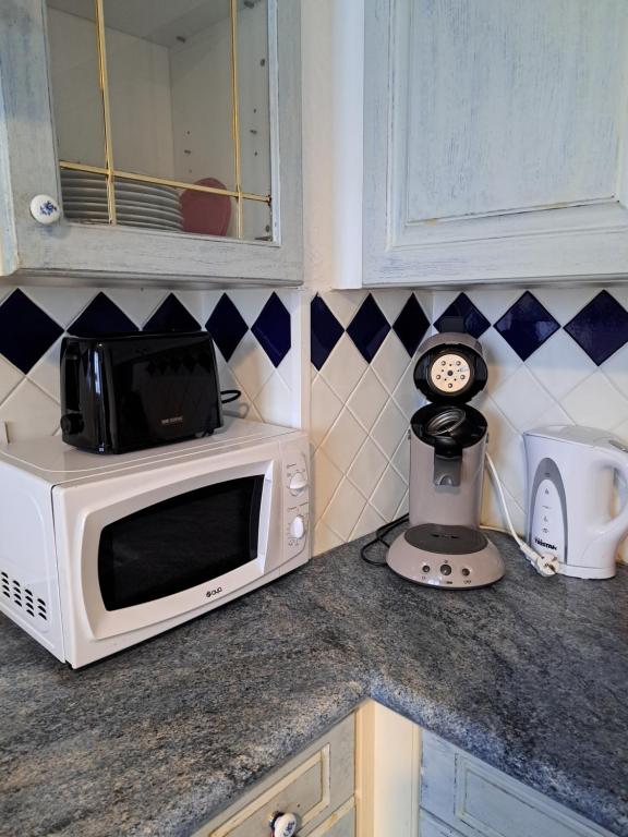 Kuchyň nebo kuchyňský kout v ubytování Chambre dans maison en colocation