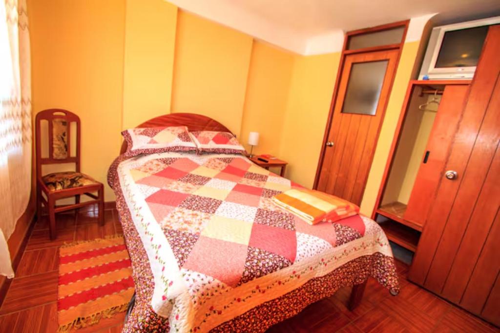 Postel nebo postele na pokoji v ubytování La Casa de Momo
