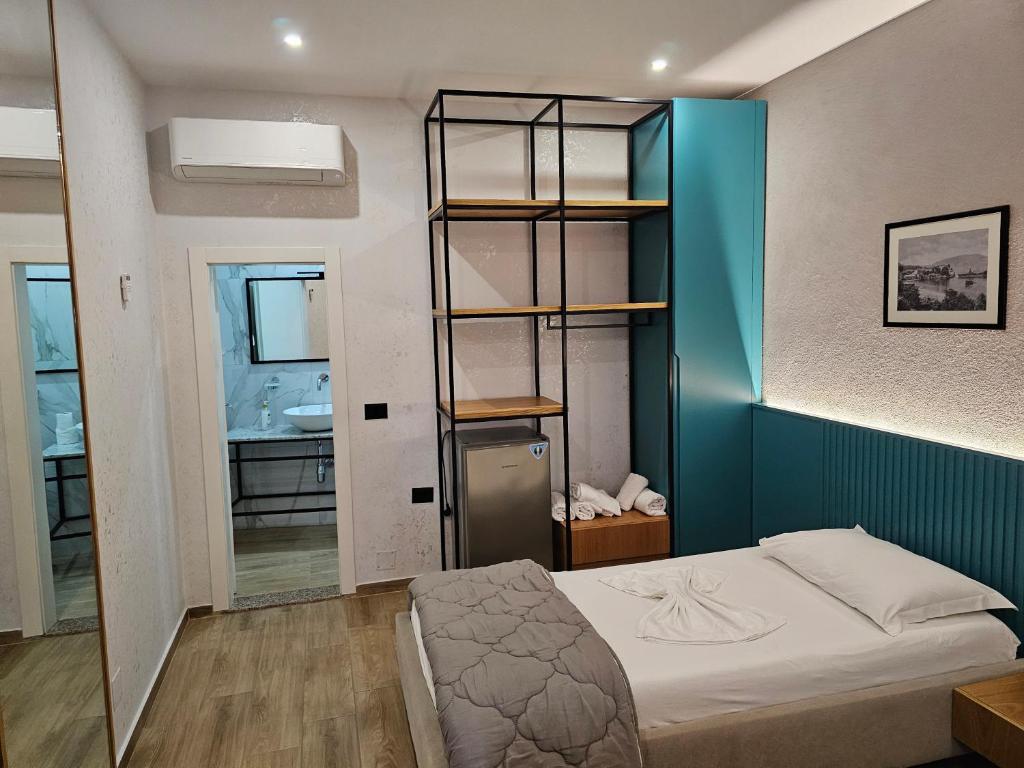 Postel nebo postele na pokoji v ubytování Hotel Ramosaco, Radhimë, Vlorë