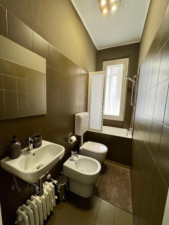 Koupelna v ubytování Vittorio Home