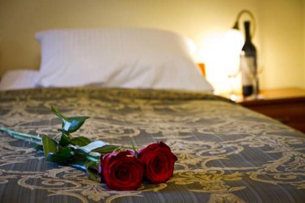 Postel nebo postele na pokoji v ubytování HOTEL I RESTAURACJA BROCHÓW