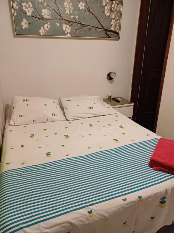 Postel nebo postele na pokoji v ubytování Casablanca Hostel Cali B&B