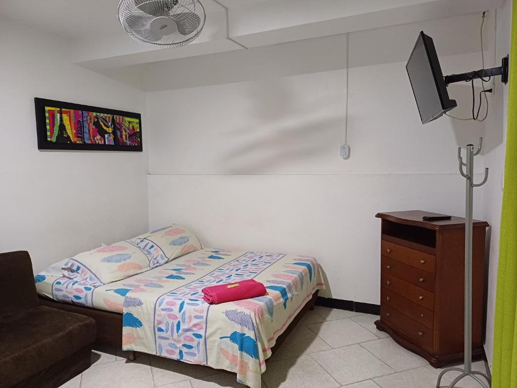 Postel nebo postele na pokoji v ubytování Casablanca Hostel Cali B&B