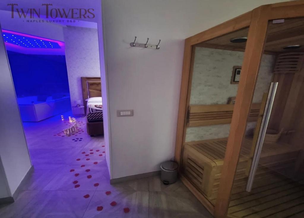 Łóżko lub łóżka w pokoju w obiekcie Twin Towers Naples Luxury