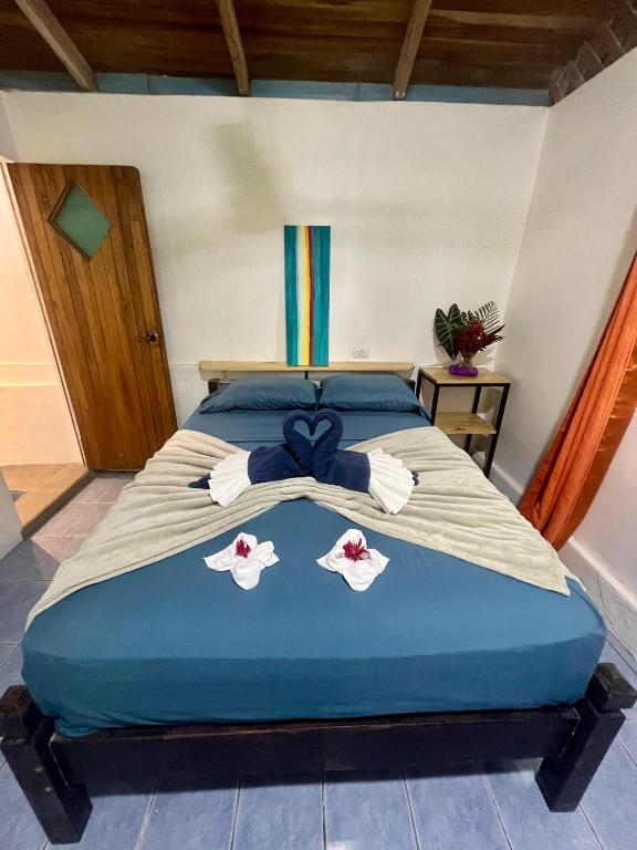 Postel nebo postele na pokoji v ubytování The Chorotega Hotel, Montezuma