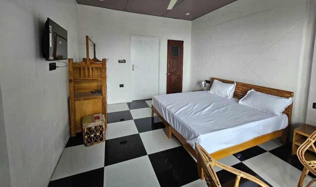 Postel nebo postele na pokoji v ubytování Nishantam Boho Mussoorie