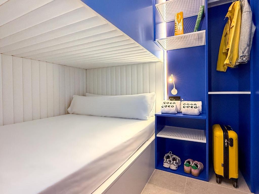Postel nebo postele na pokoji v ubytování Coeo Hernan Ruiz Rooftop Pool Hostel