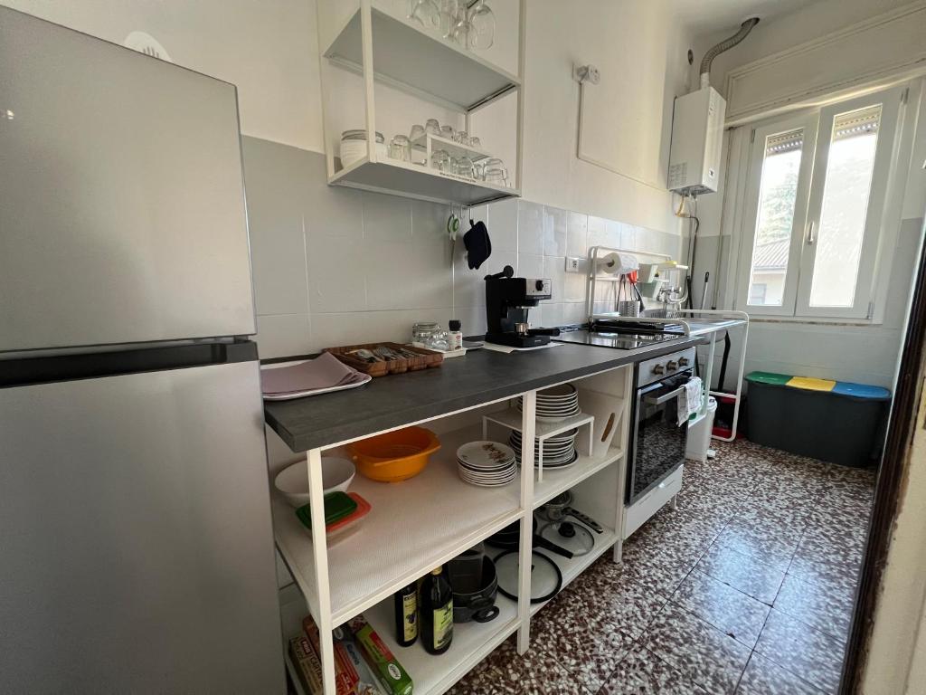 Kuchyň nebo kuchyňský kout v ubytování O&R Home Crema