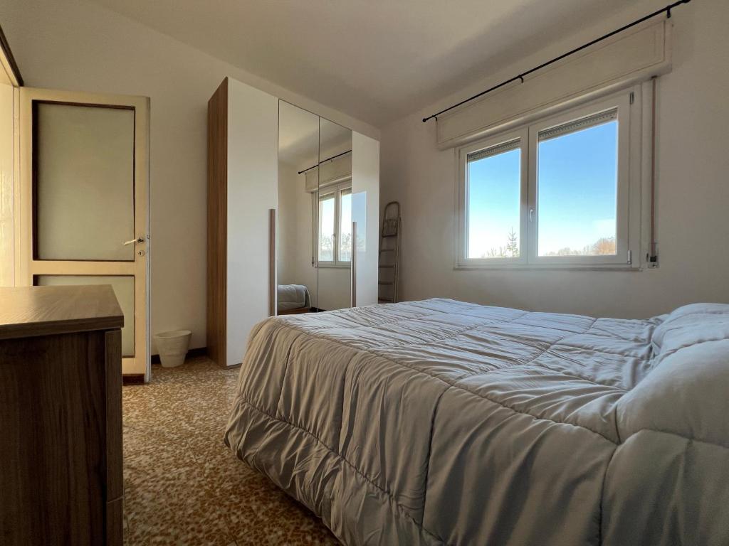 Postel nebo postele na pokoji v ubytování O&R Home Crema