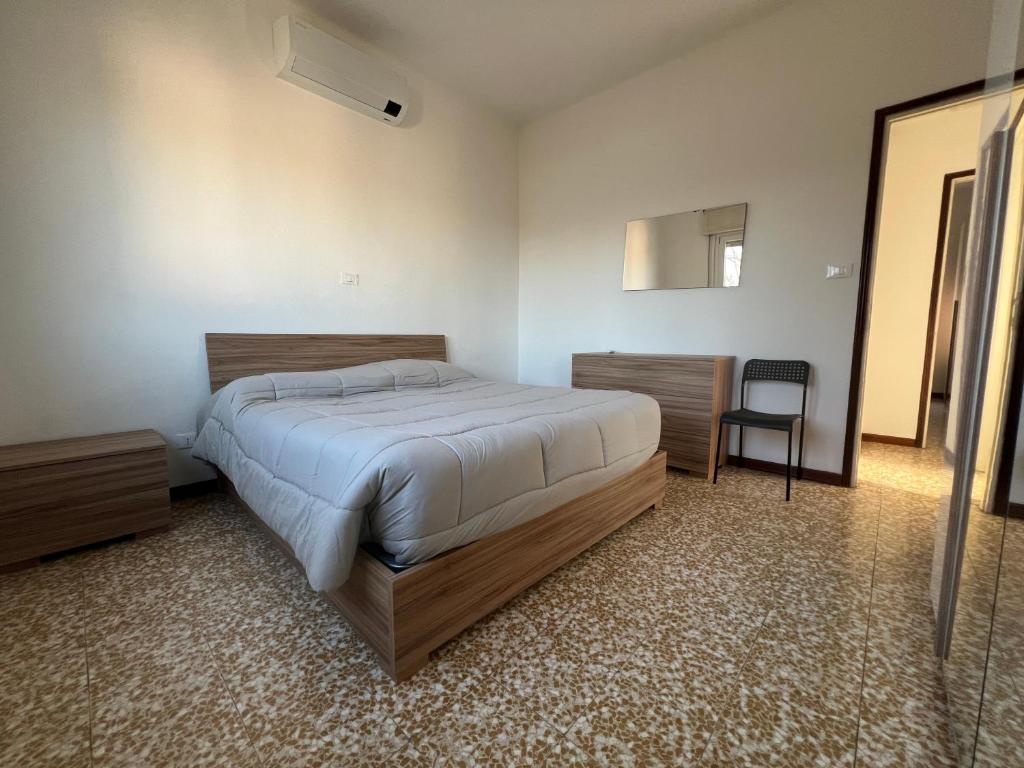 Postel nebo postele na pokoji v ubytování O&R Home Crema