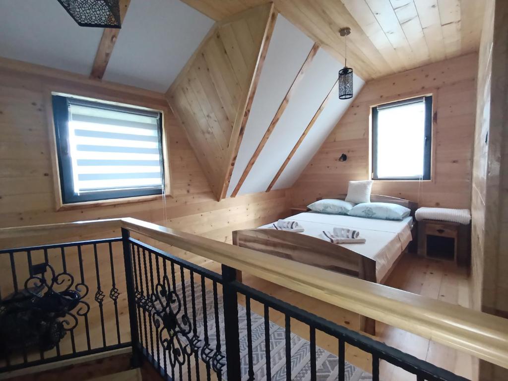 Postel nebo postele na pokoji v ubytování Vila Helena -Apartman 2