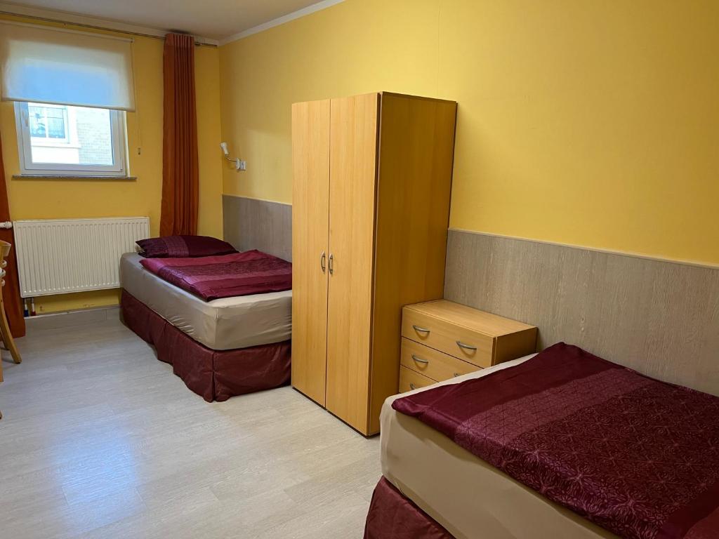 Postel nebo postele na pokoji v ubytování PensionLien