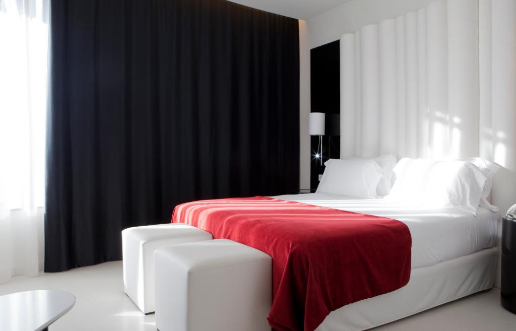 מיטה או מיטות בחדר ב-Hotel Porta Fira 4* Sup