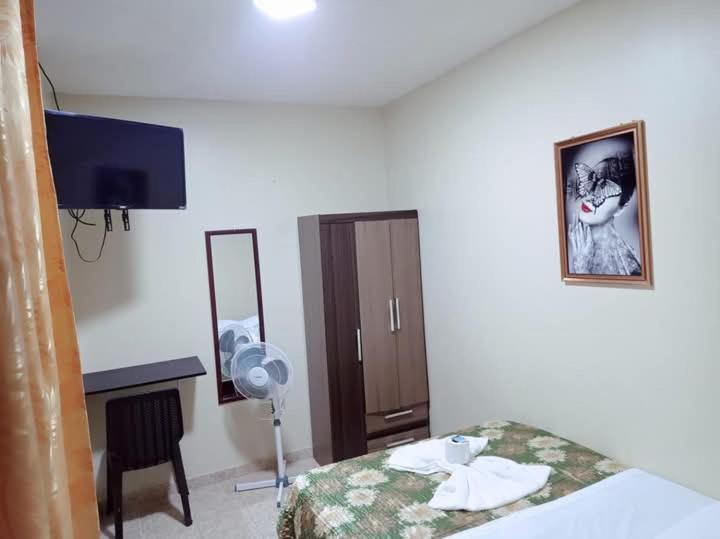Postel nebo postele na pokoji v ubytování Hostal Real Piura - Oficial
