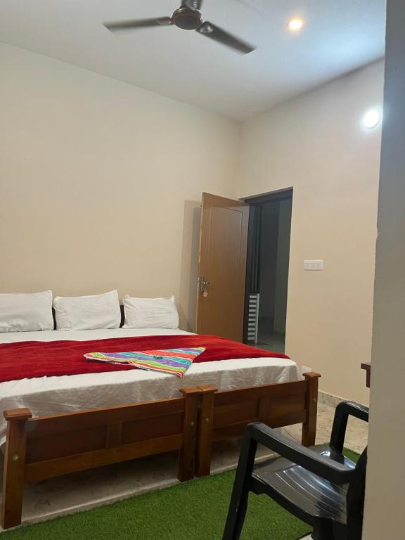 Postel nebo postele na pokoji v ubytování VARIYATH HOMESTAY THIRUNELLi