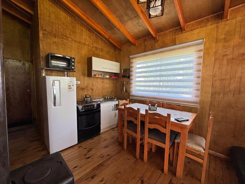 Una cocina o zona de cocina en Cabañas EcoSur - Chile