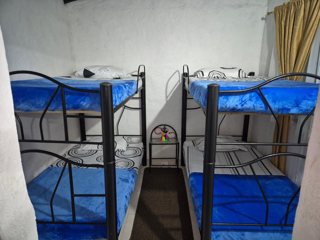Postel nebo postele na pokoji v ubytování Cabaña Campestre de descanso