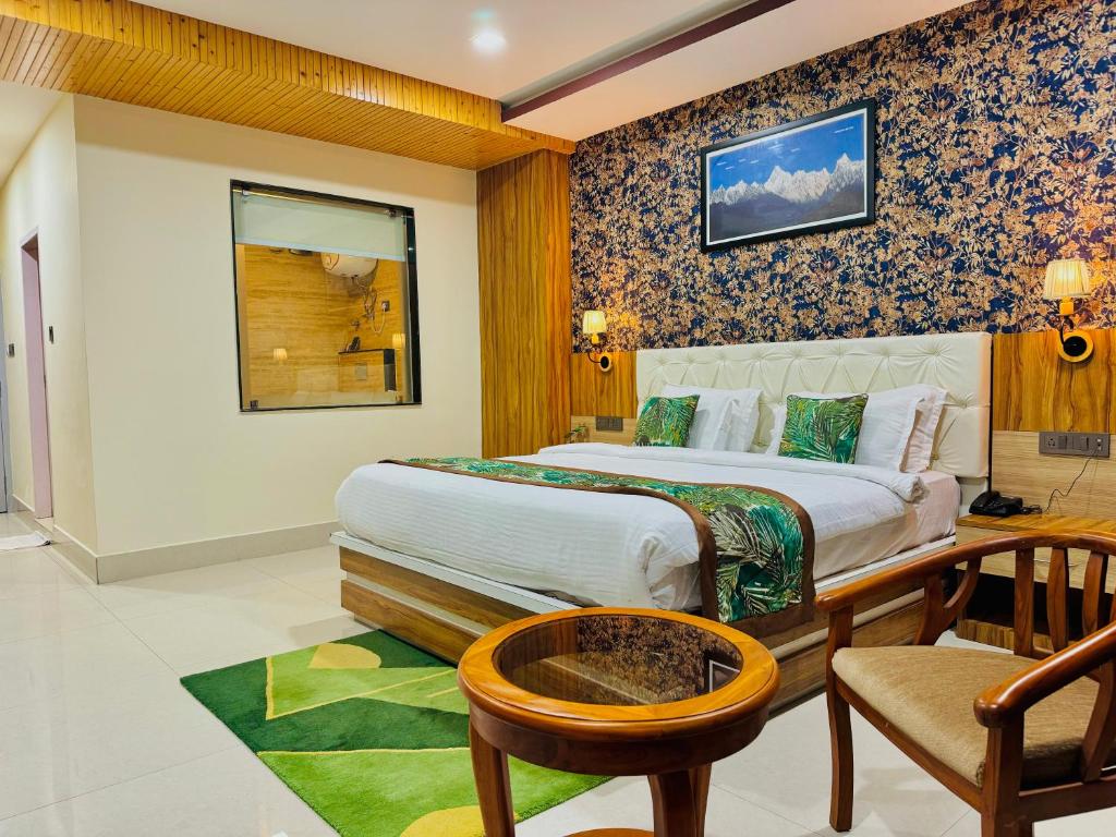 Postel nebo postele na pokoji v ubytování The Z retreat and SPA Gangtok 4 STAR LUXURY RESORT