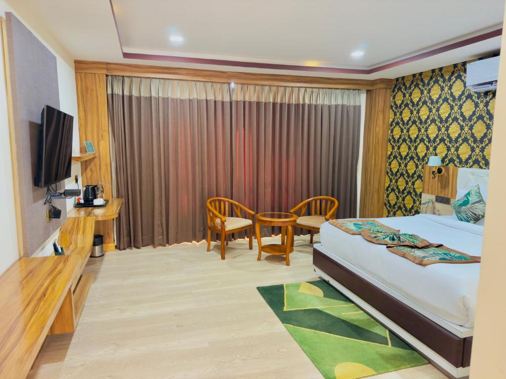 TV a/nebo společenská místnost v ubytování The Z retreat and SPA Gangtok 4 STAR LUXURY RESORT