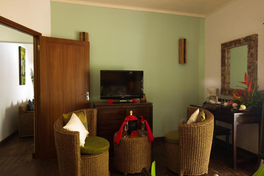 TV a/nebo společenská místnost v ubytování Le Relax Beach Resort