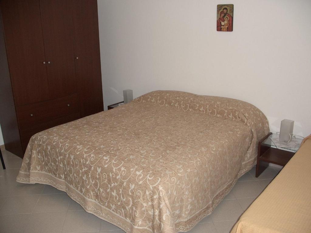 Postel nebo postele na pokoji v ubytování B&B Il Sogno