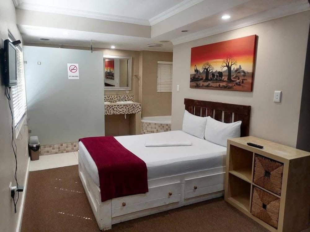 Voodi või voodid majutusasutuse Wampex Guest House In East London toas