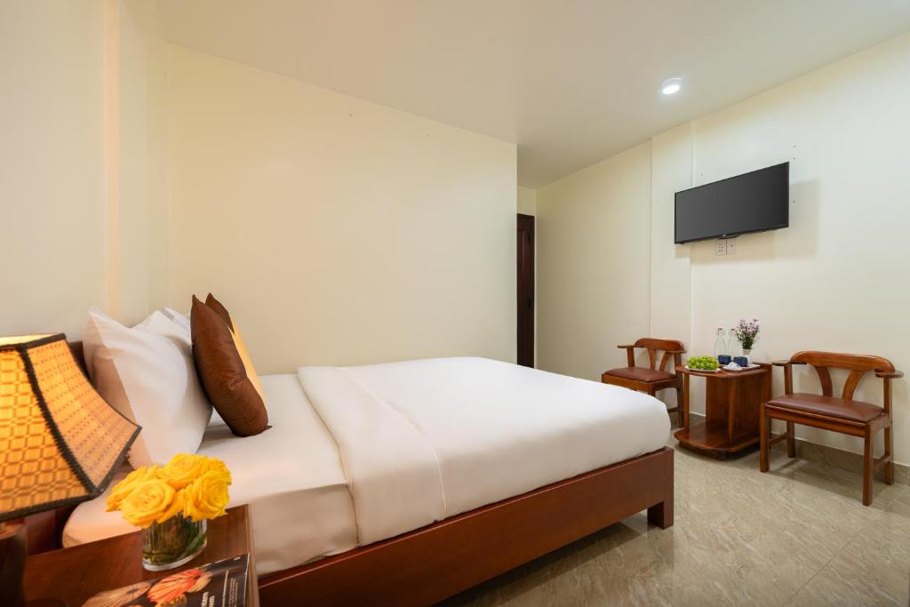 TV a/nebo společenská místnost v ubytování Sun Moon Riverside Hoi An