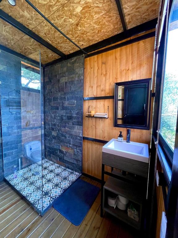 TV a/nebo společenská místnost v ubytování Sans Souci Cabaña - Parejas
