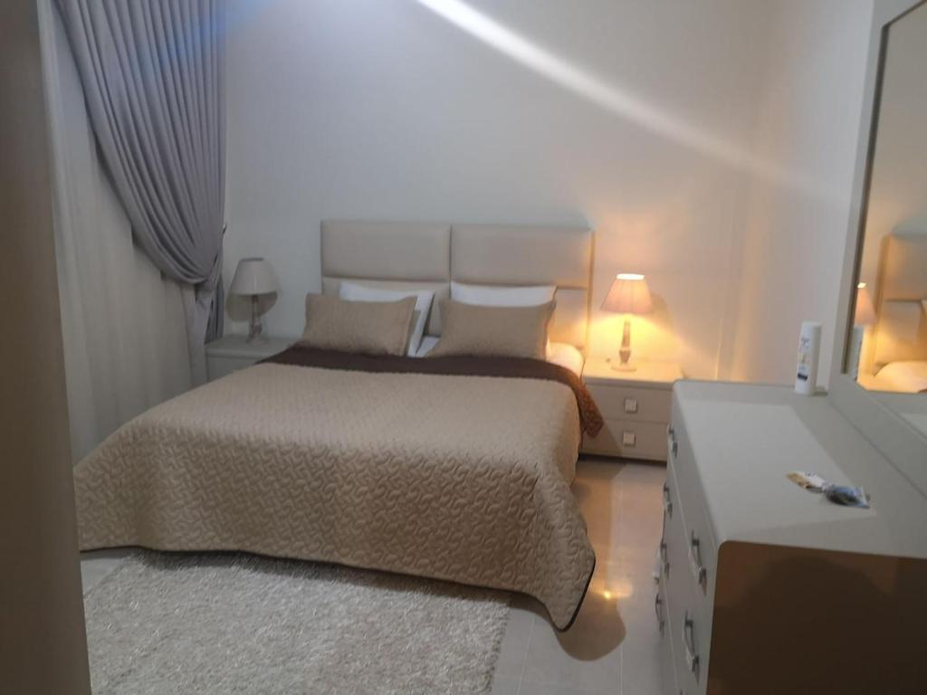 Postel nebo postele na pokoji v ubytování Apartment with pool in Sousse