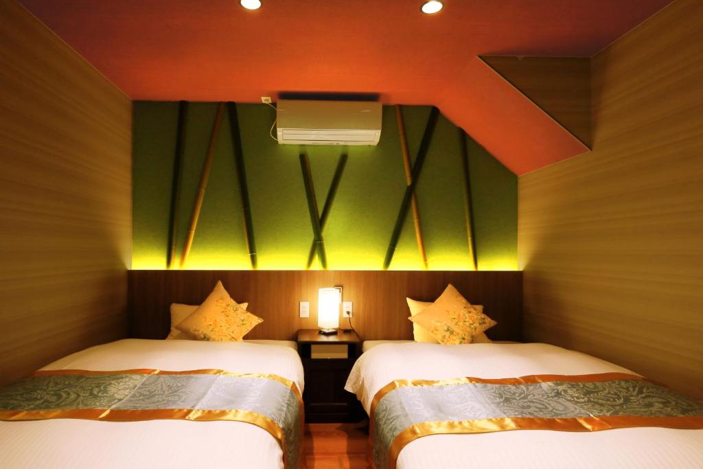 Кровать или кровати в номере 竹のお宿