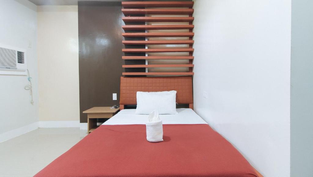 Postel nebo postele na pokoji v ubytování E. Moreno Recreation Beach Resort Ilocos Sur
