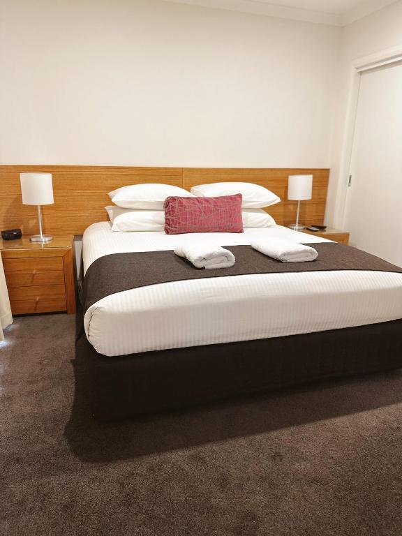 Postel nebo postele na pokoji v ubytování Red Earth Motel