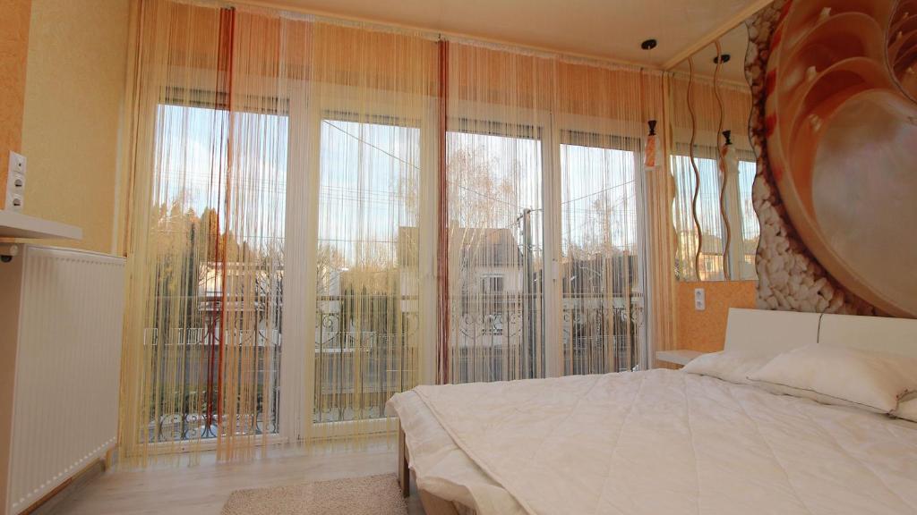 Posteľ alebo postele v izbe v ubytovaní I love Heviz Apartments