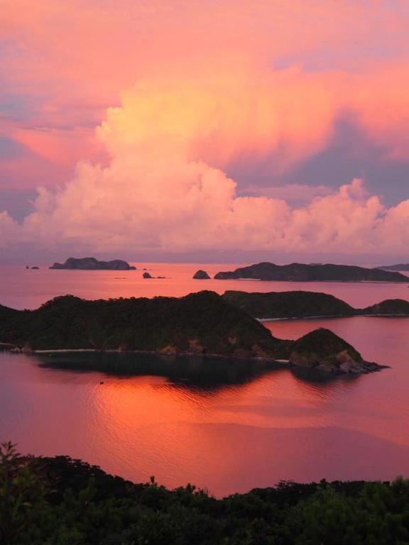 an island in the middle of a large body of water at Cha Villa in Zamami