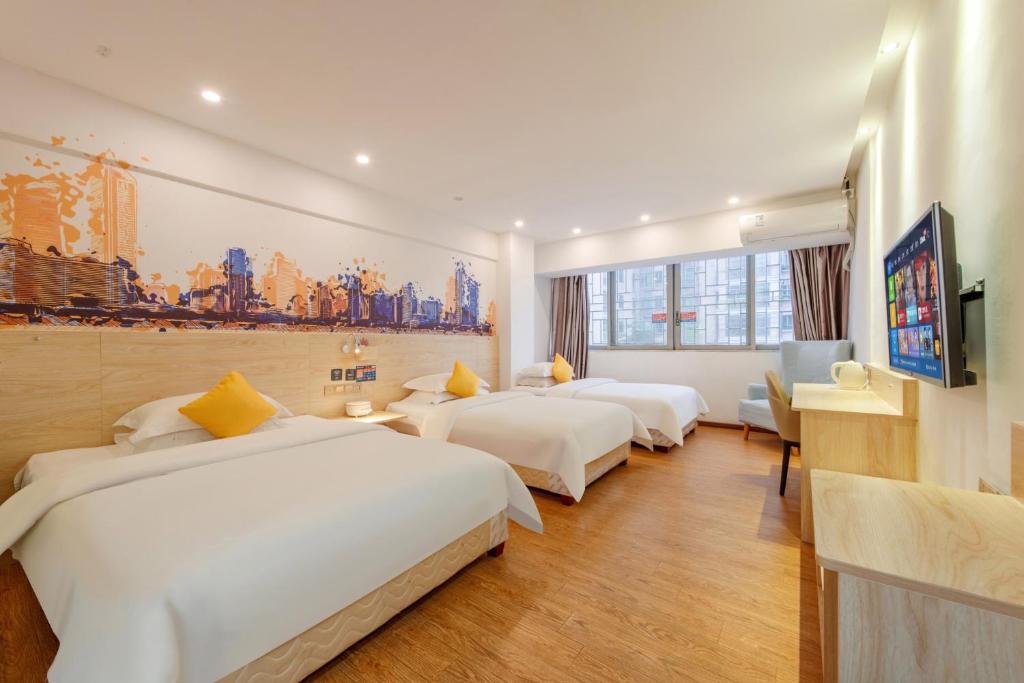TV a/nebo společenská místnost v ubytování 7 Days Inn Foshan Lecong Furniture Branch