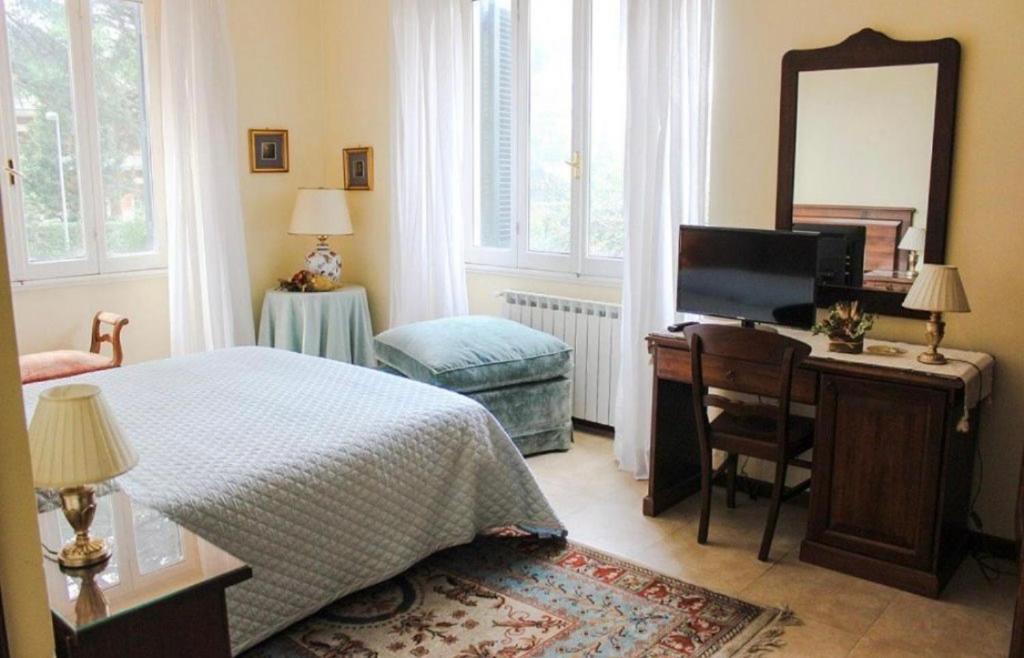 Postel nebo postele na pokoji v ubytování Villa Orsini