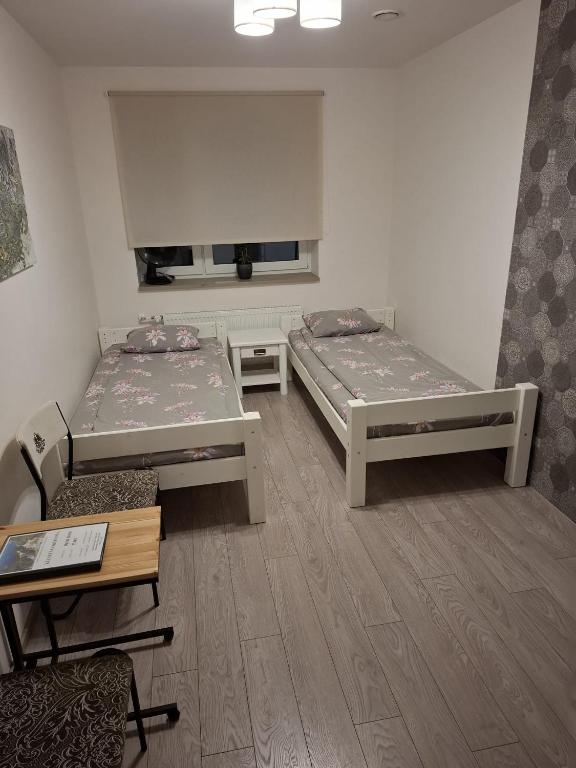 Postel nebo postele na pokoji v ubytování Ermistu Puhkeküla