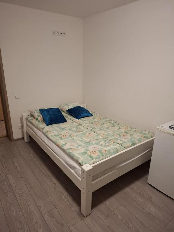 Postel nebo postele na pokoji v ubytování Ermistu Puhkeküla