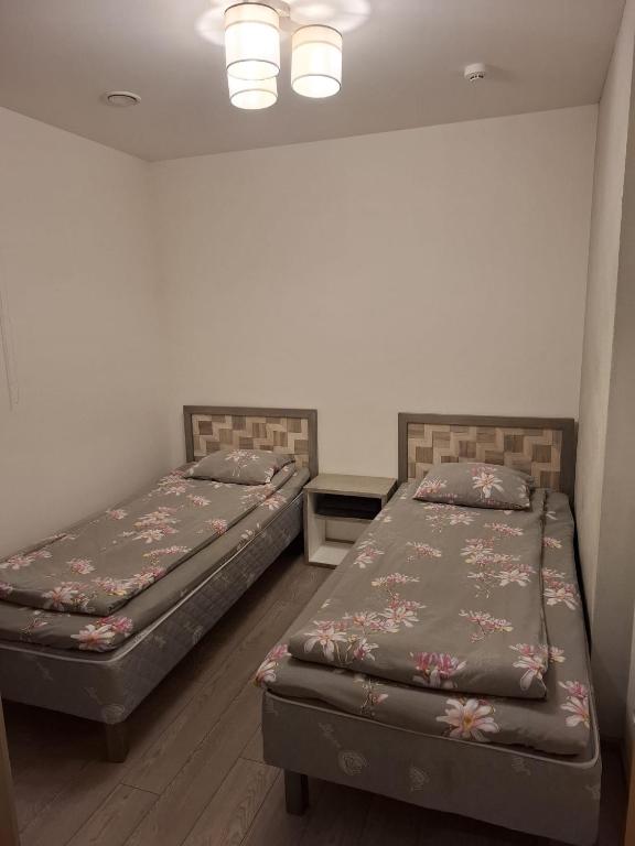 Postel nebo postele na pokoji v ubytování Ermistu Puhkeküla