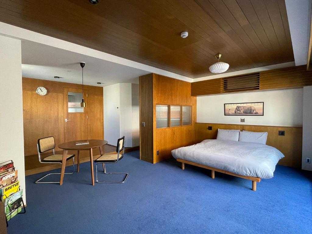 Postel nebo postele na pokoji v ubytování NO SERVICE HOTEL asakusa