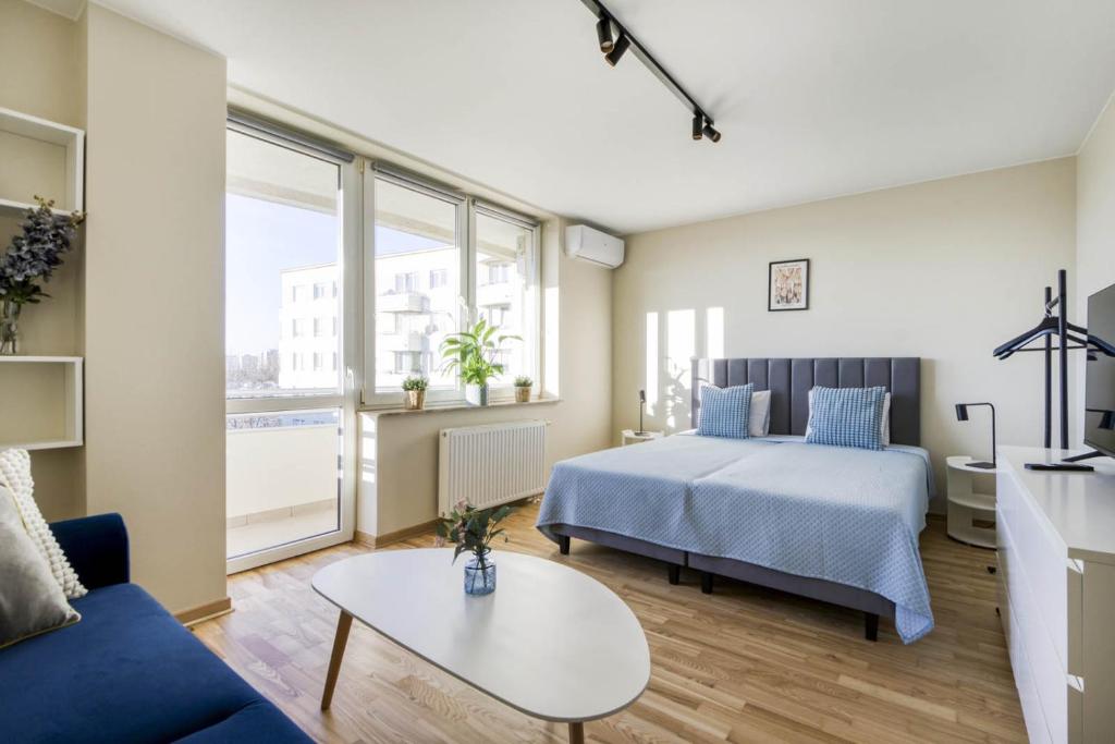 Posteľ alebo postele v izbe v ubytovaní Gama Home Kondratowicza18