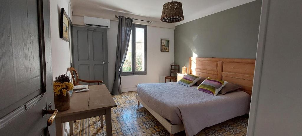 Postel nebo postele na pokoji v ubytování Bastide Sainte Agnès