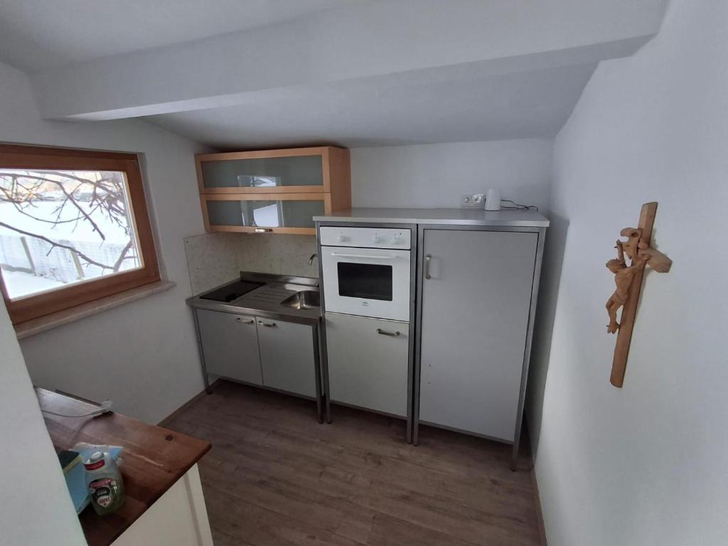 Kuchyň nebo kuchyňský kout v ubytování Chalet Scheffsnoth