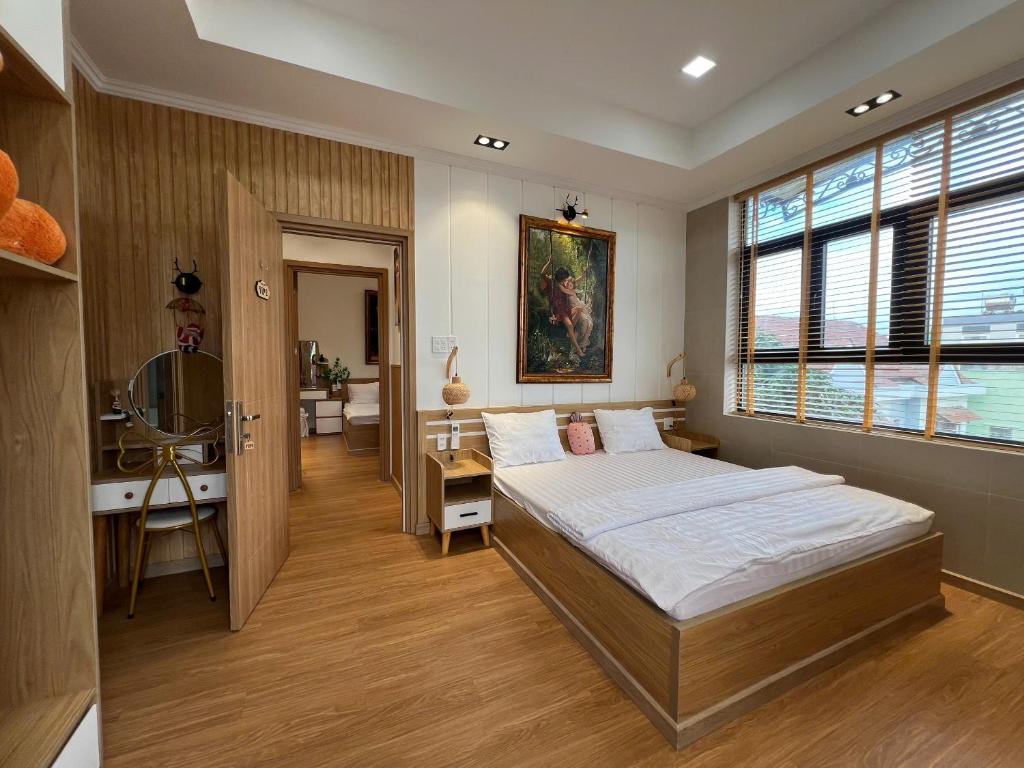 Ένα ή περισσότερα κρεβάτια σε δωμάτιο στο Sunrise Villa Phan Thiết - Màu Của Nắng