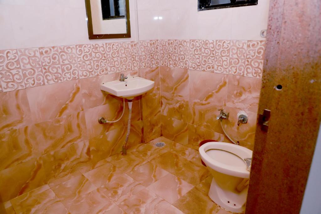 Koupelna v ubytování Hotel Matoshree