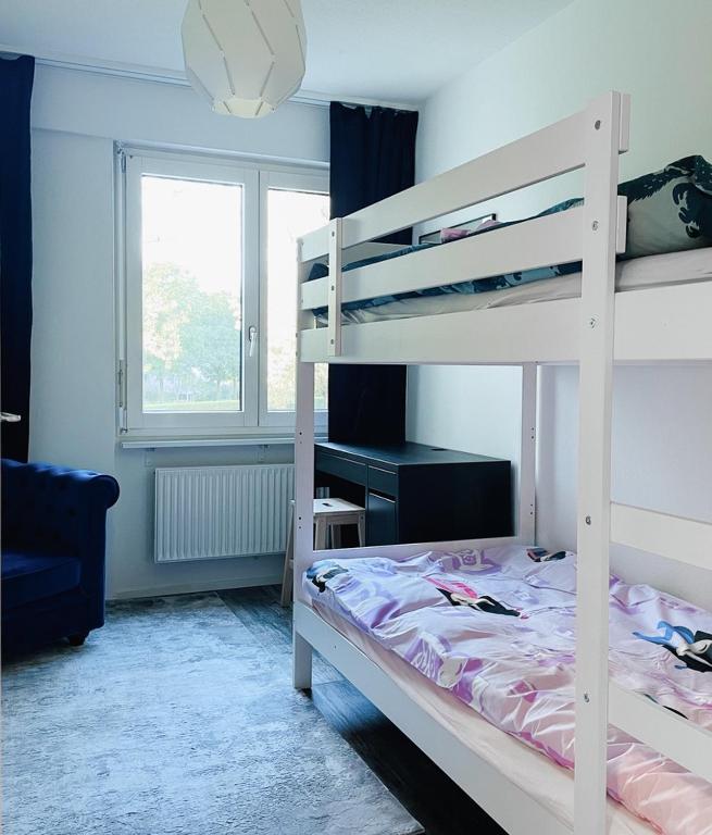 Postel nebo postele na pokoji v ubytování Modern apartment in top location