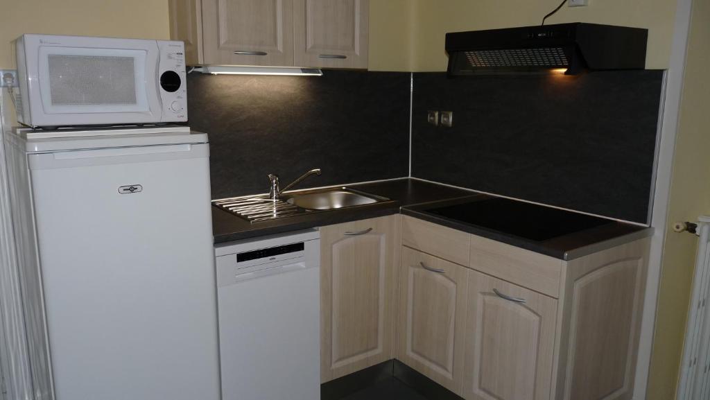 Køkken eller tekøkken på Le Castel Médicis